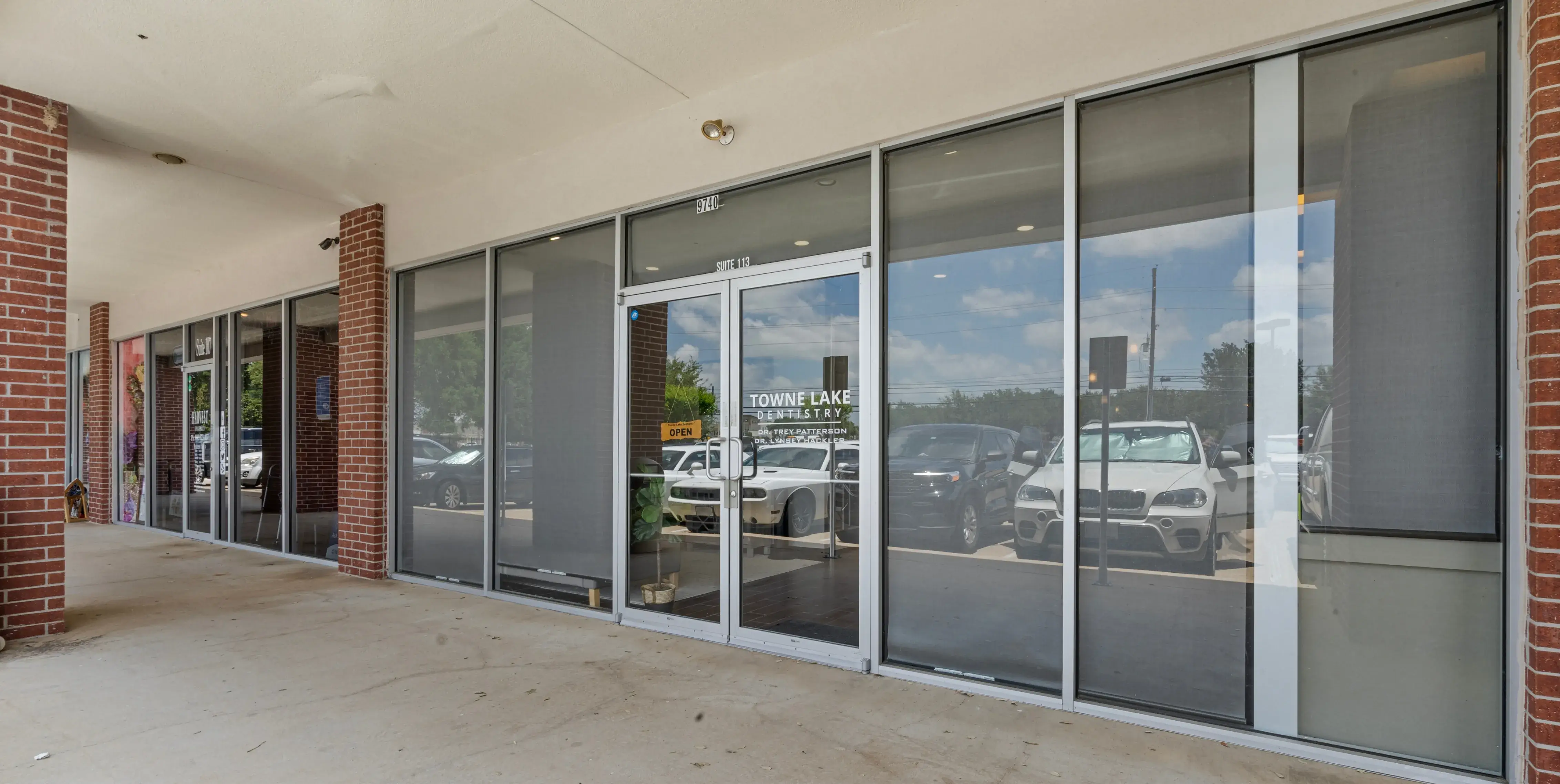 a building with a lot of glass doors